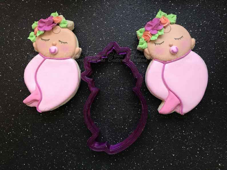 Miss Doughmestic Swaddled Baby with Florals #3 Cookie Cutter and Fondant Cutter and Clay Cutter,
                      baby shower cutters, baby shower cookie cutters, baby shower fondant cutters, baby shower cutter, boss baby cookie cutter, baby themed cookie cutters, wildlife cookie cutters, disney fondant cutters, moon cookie cutter, dog treat cookie molds, funny christmas cookie cutters, plaque cookie cutter, hot dog cookie cutter, amazon cookie cutters,
                      