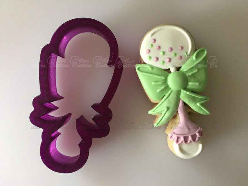 Miss Doughmestic Baby Rattle with Bow Cookie Cutter and Fondant Cutter and Clay Cutter,
                      baby shower cutters, baby shower cookie cutters, baby shower fondant cutters, baby shower cutter, boss baby cookie cutter, baby themed cookie cutters, circus animal cookie cutters, beehive cookie cutter, southwest cookie cutters, ctr cookie cutter, hello kitty cookie cutter, antler cookie cutter, kaleidacuts baby, christmas themed cookie cutters,
                      