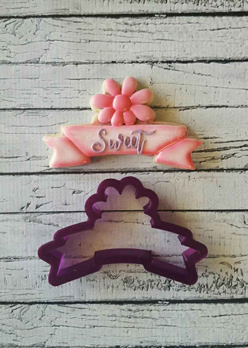 Banner with Flower Cookie Cutter and Fondant Cutter and Clay Cutter,
                      banner cookie cutter, ribbon cookie cutter, cookie cutters, grad cookie cutter, graduation cookie cutters, banner shape cutters, avocado cookie cutter, tangled cookie cutters, cactus cookie cutter, thomas the train cookie cutter, unicorn cookie cutter michaels, deep scone cutter, large heart cookie cutter, bee shaped cookie cutter,
                      